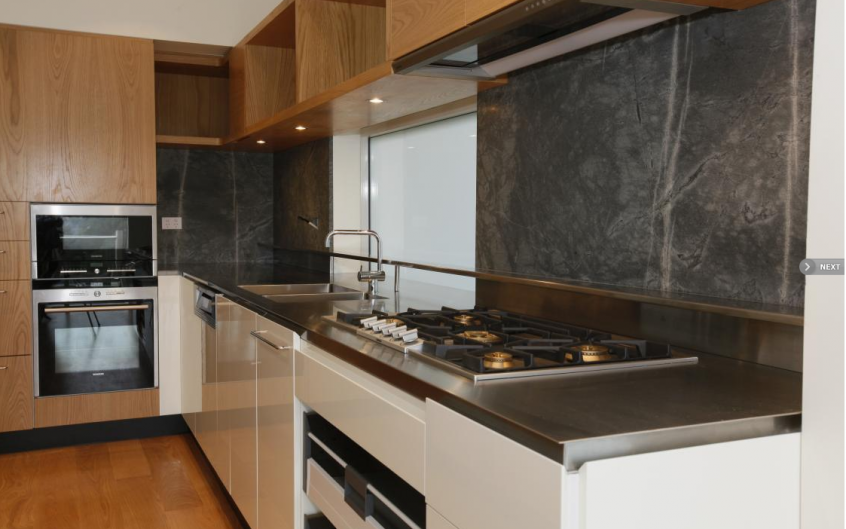 Polyurethane And American Oak Kitchen With Stone Splash 